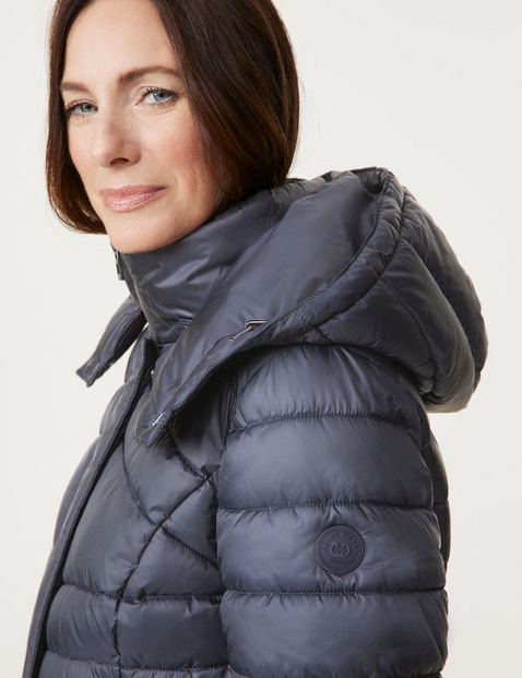 Quilted jacket with a detachable hood