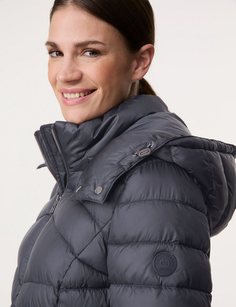 Quilted coat with a detachable hood