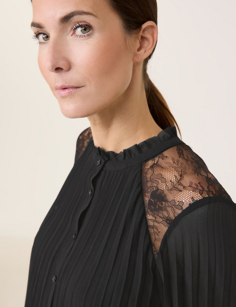 Pleated blouse with a lace insert