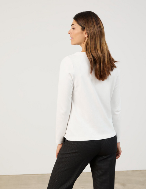 Long sleeve top with a front print and sequins