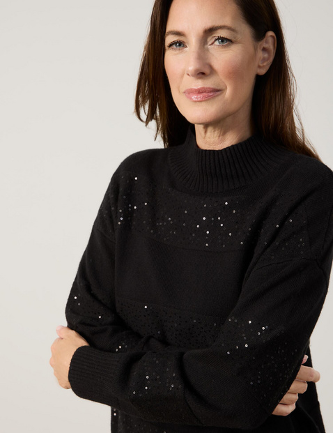 Turtleneck jumper with decorative details