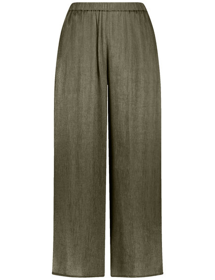 Flowing cloth trousers with a crinkle finish