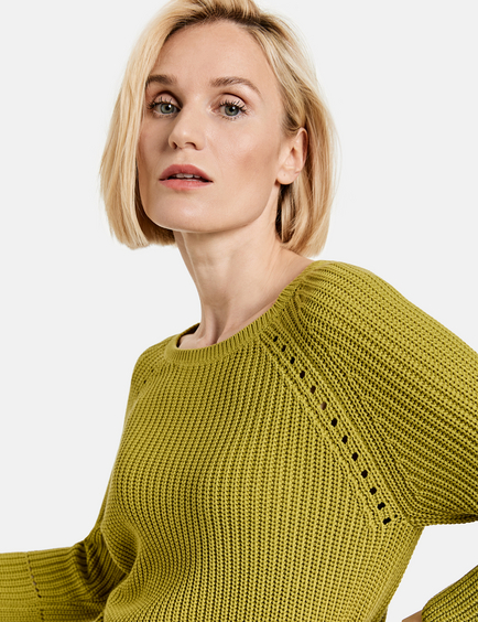 green knit jumper