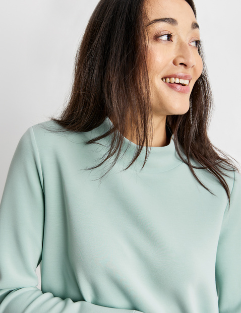 Sweatshirt dress with a stand-up collar