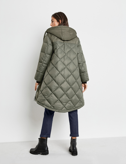 green quilted coat