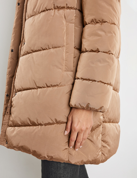 Quilted coat with a large hood