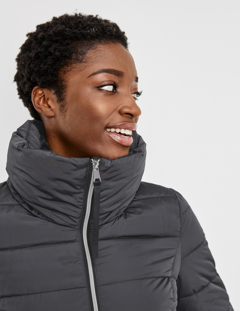 Quilted jacket with a warm stand-up collar