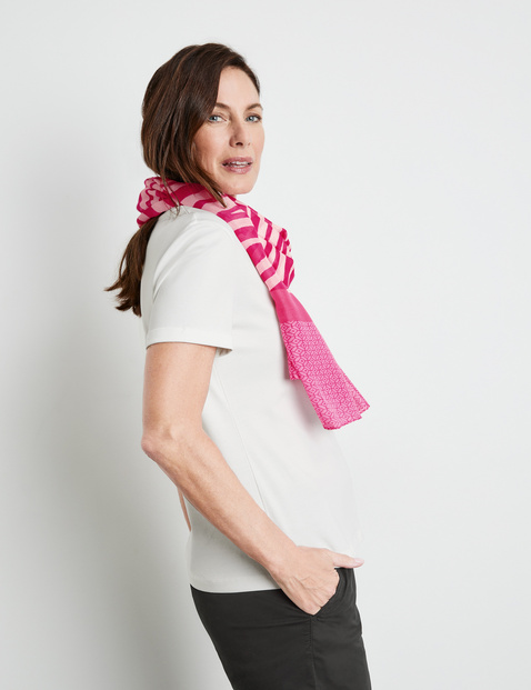 Flowing scarf with a panelled animal print