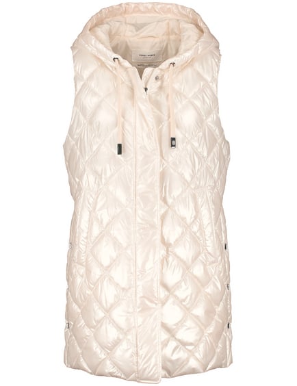 long cream body warmer