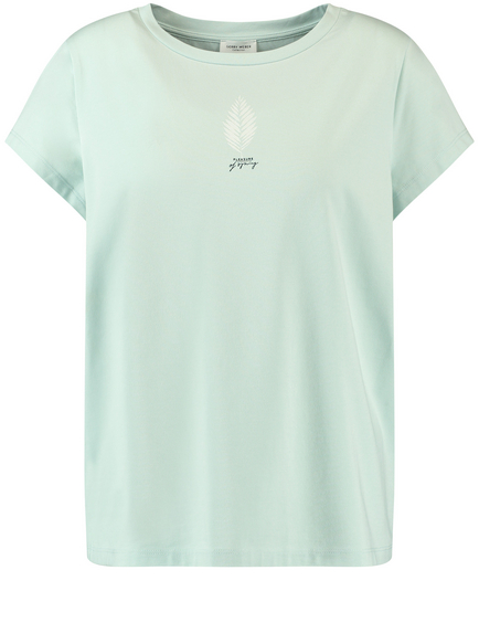 white t shirt with green print