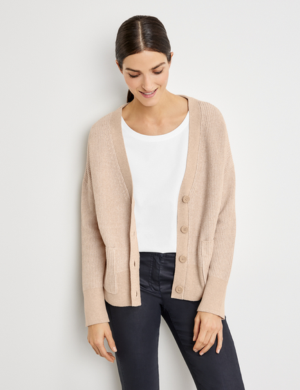 tan coloured cardigan