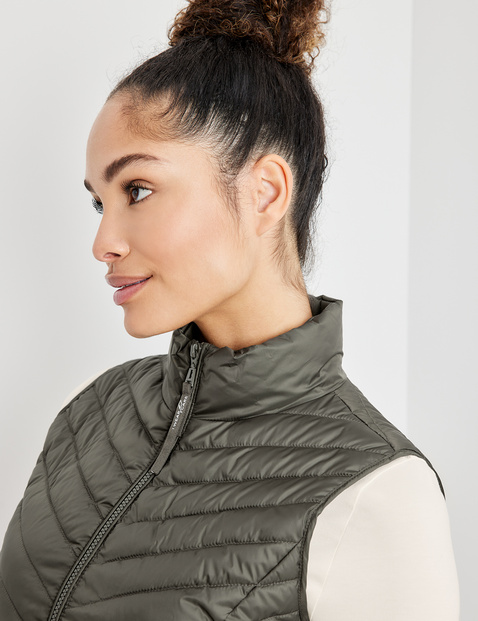 Quilted body warmer made of recycled polyester