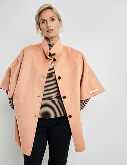 Beige cape clearance coat