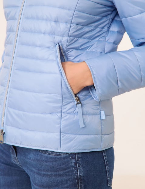 Quilted jacket with a detachable hood