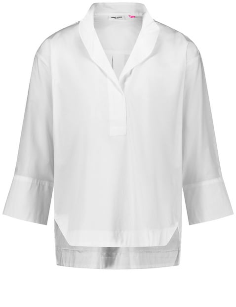 white no sleeve blouse