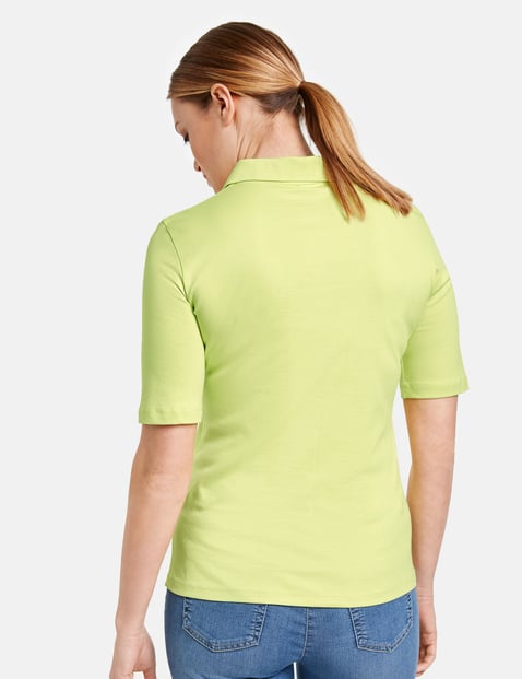 yellow and green polo shirt