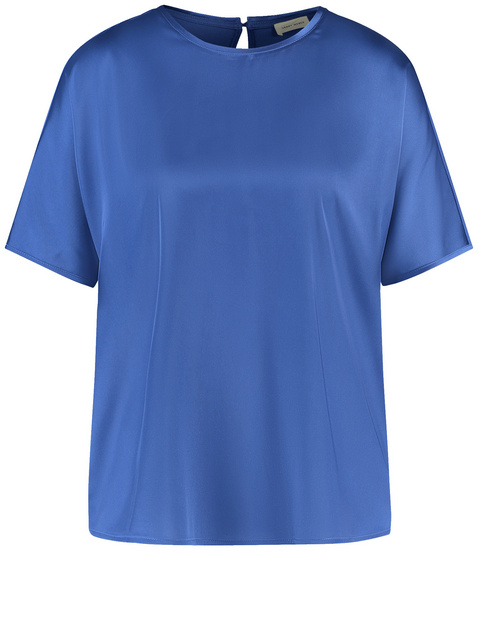 Casual blouse top with fabric panelling