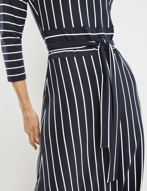 Dress with vertical stripes